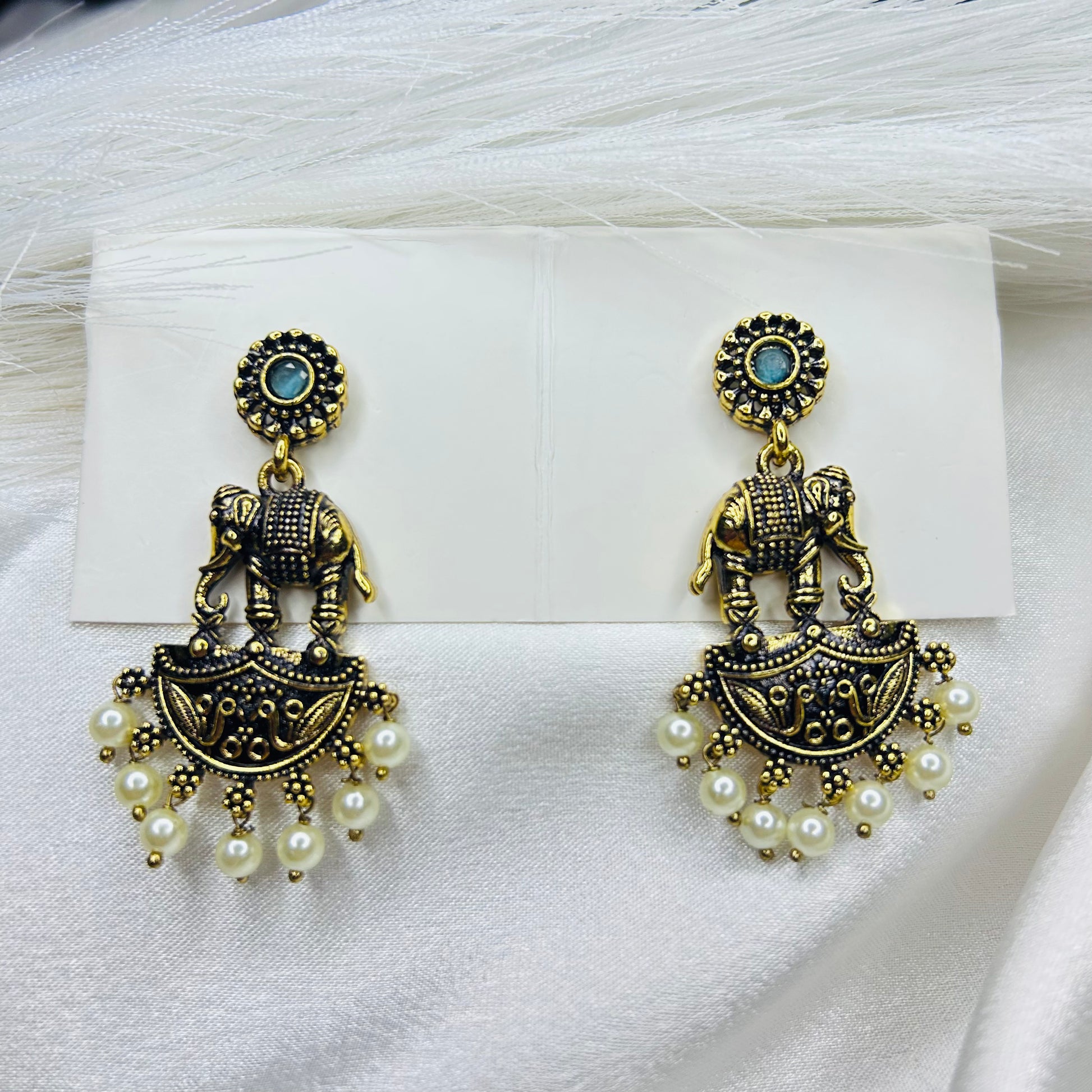elephant shapes sky- blue stone golden ethnic drop earring 