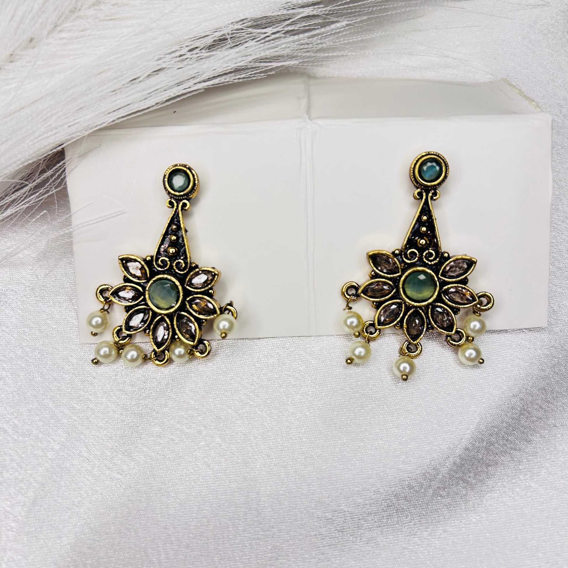 Ethnic gold tone Sea green stone Floral design Indian earrings