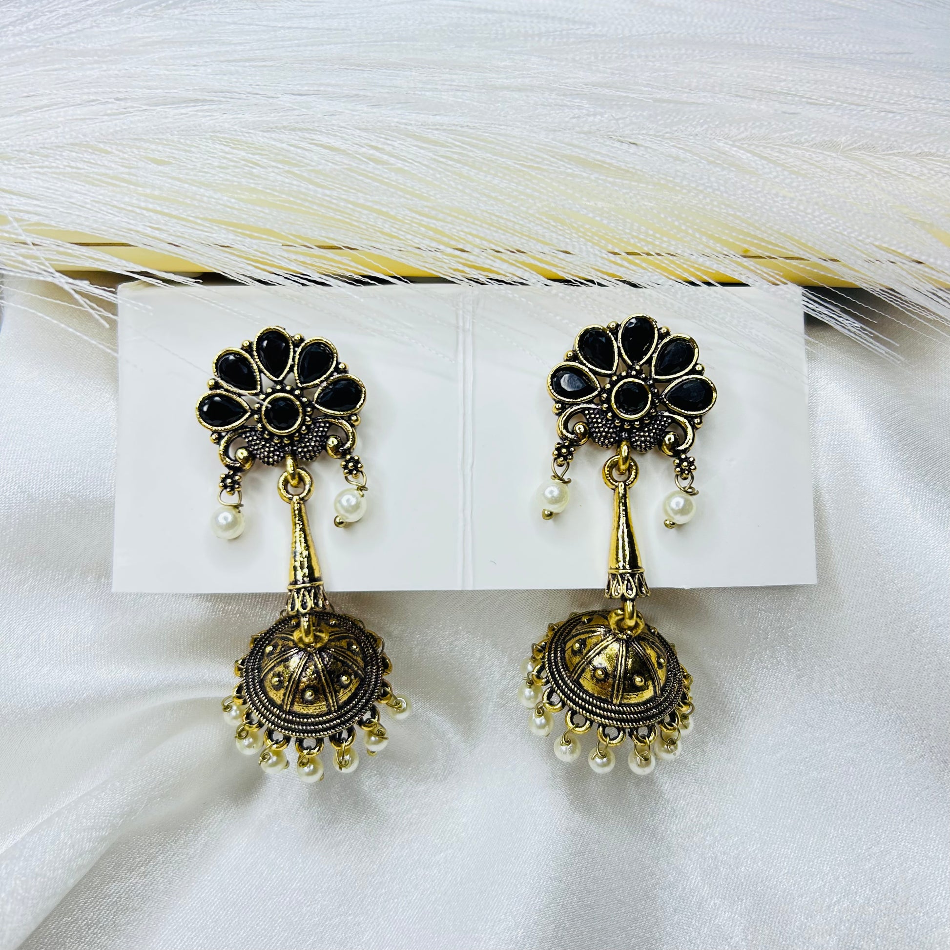Jhumka Earrings with Black Stone Floral Design