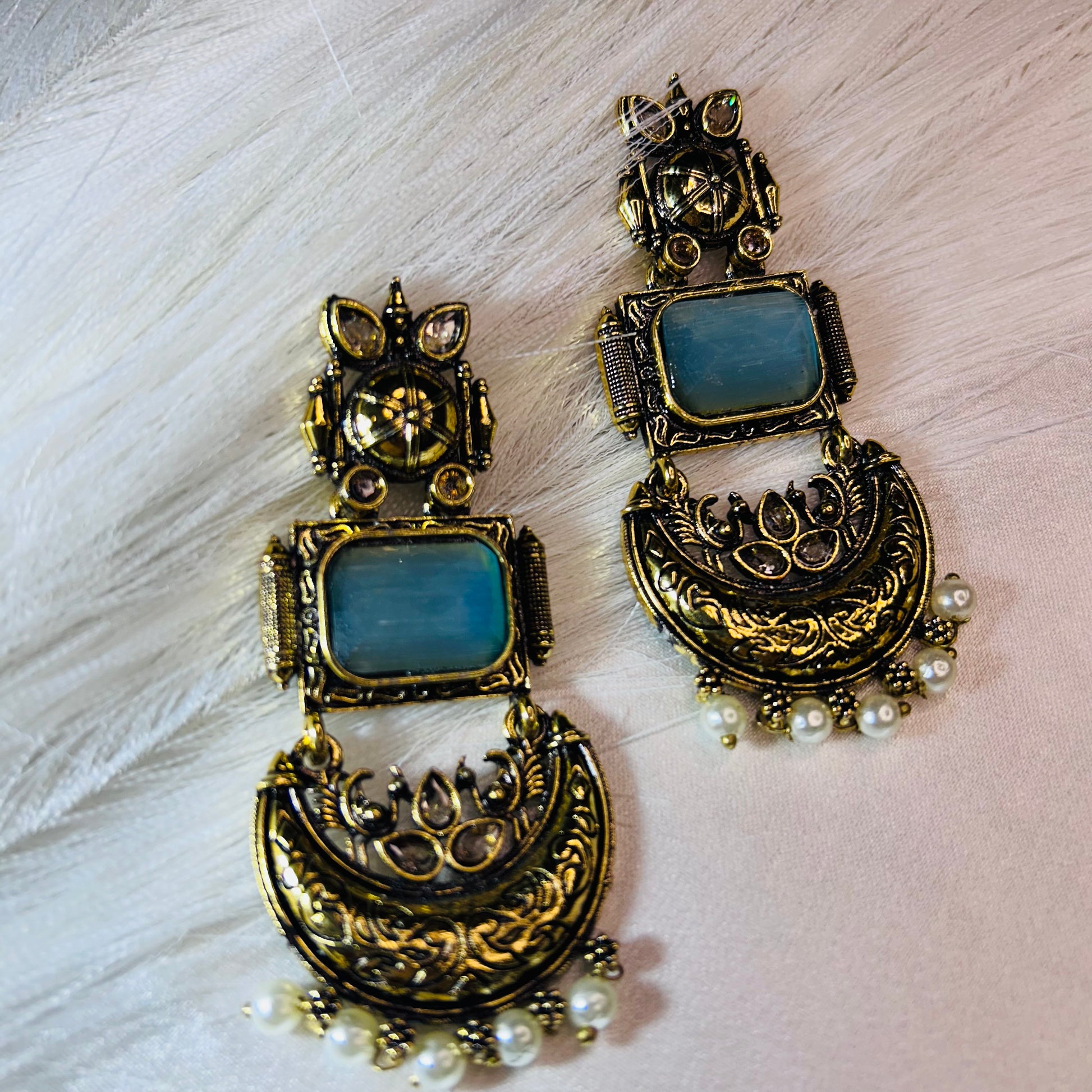 Ethnic Elegance Light Blue Stone Golden Dangler Earrings