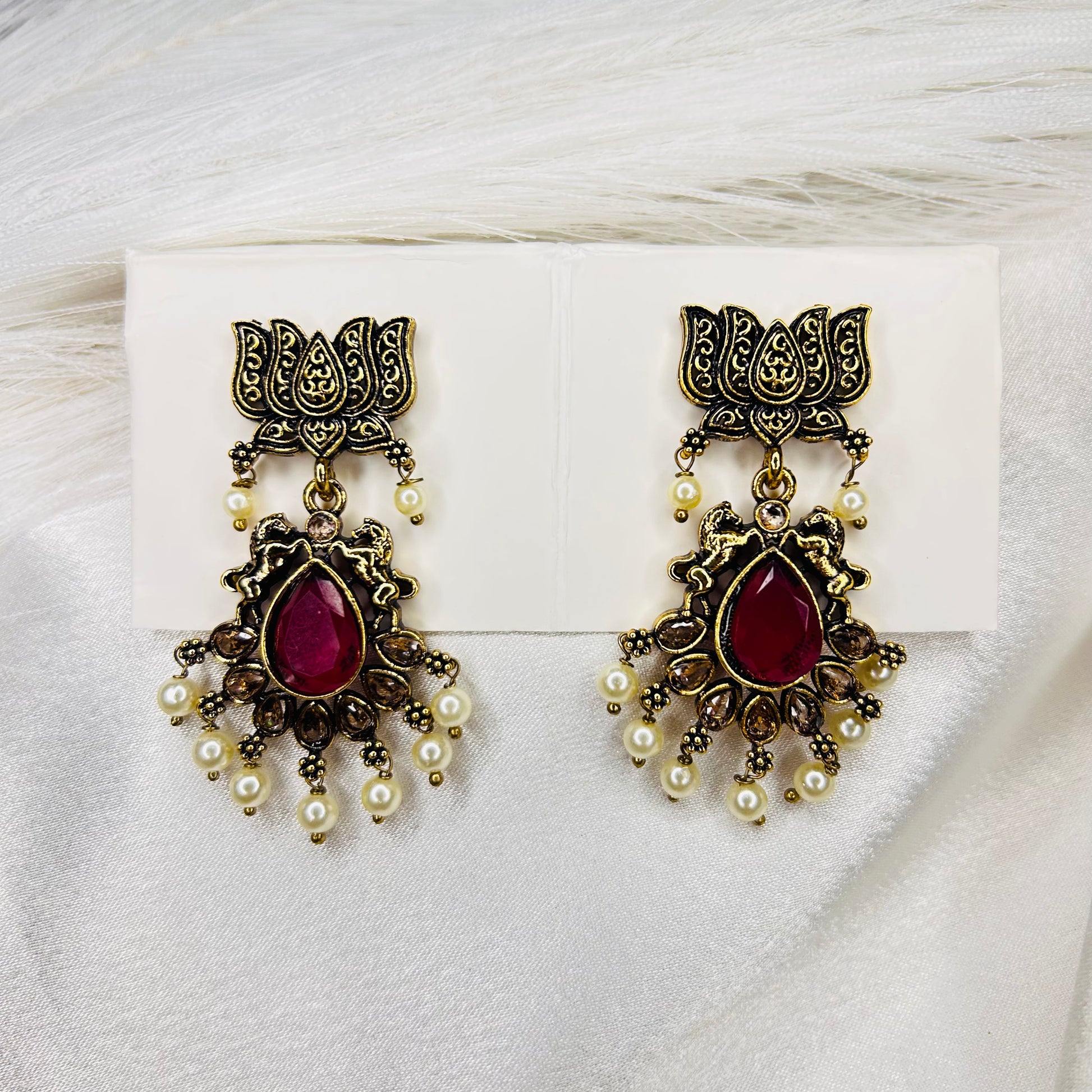 Lotus Motif Golden Drop Earrings