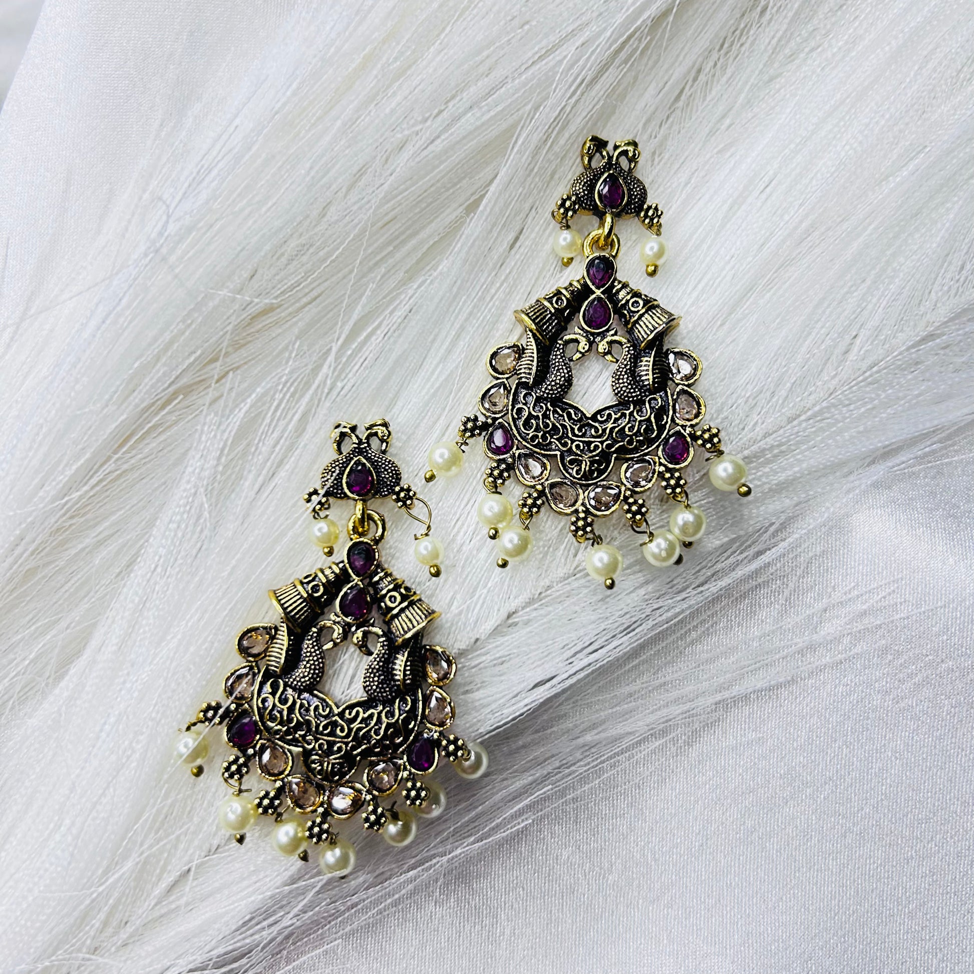 Golden Drop Chandbali Earrings with Magenta Stone & Peacock Motif