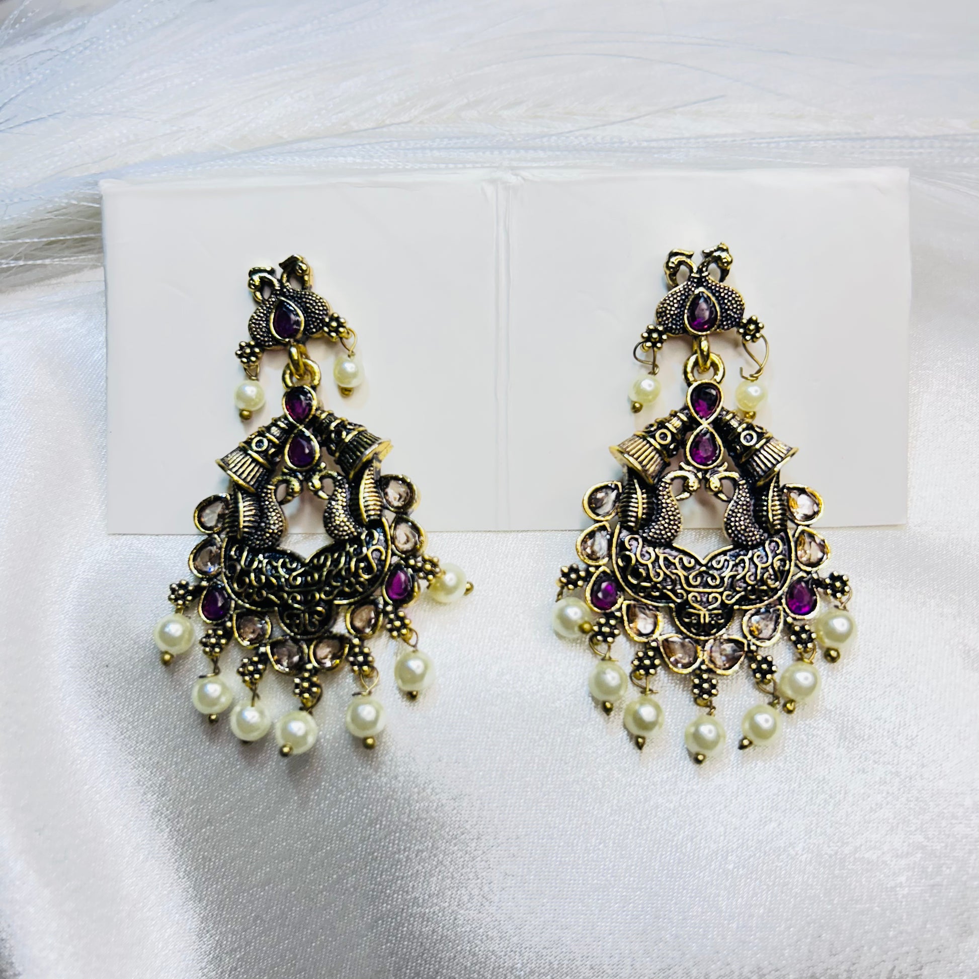 Golden Drop Chandbali Earrings with Magenta Stone & Peacock Motif