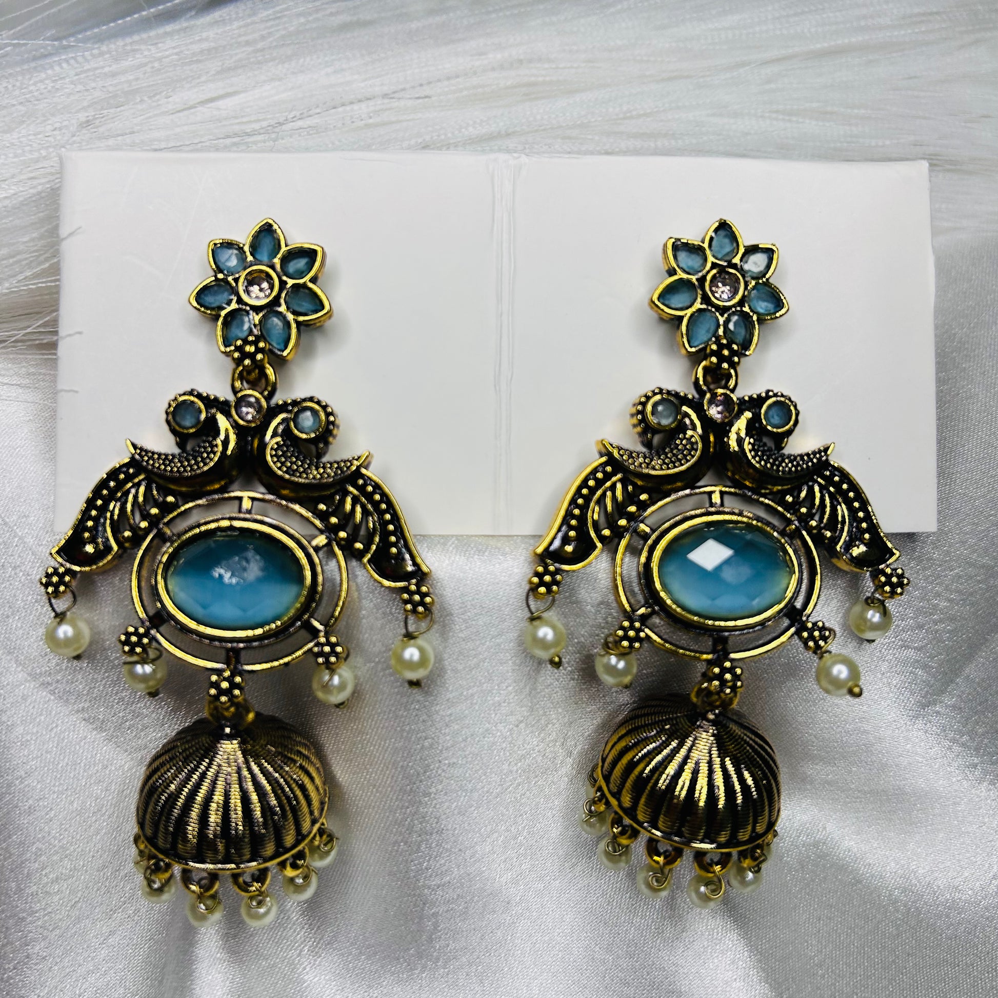 Ethnic Golden Peacock Dangler Earrings with Sky Blue Stone